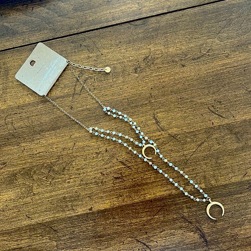 **New half moon long gold necklace with blue & brown beads - new in original pkg